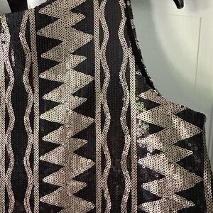 Short black and gold sequin dress